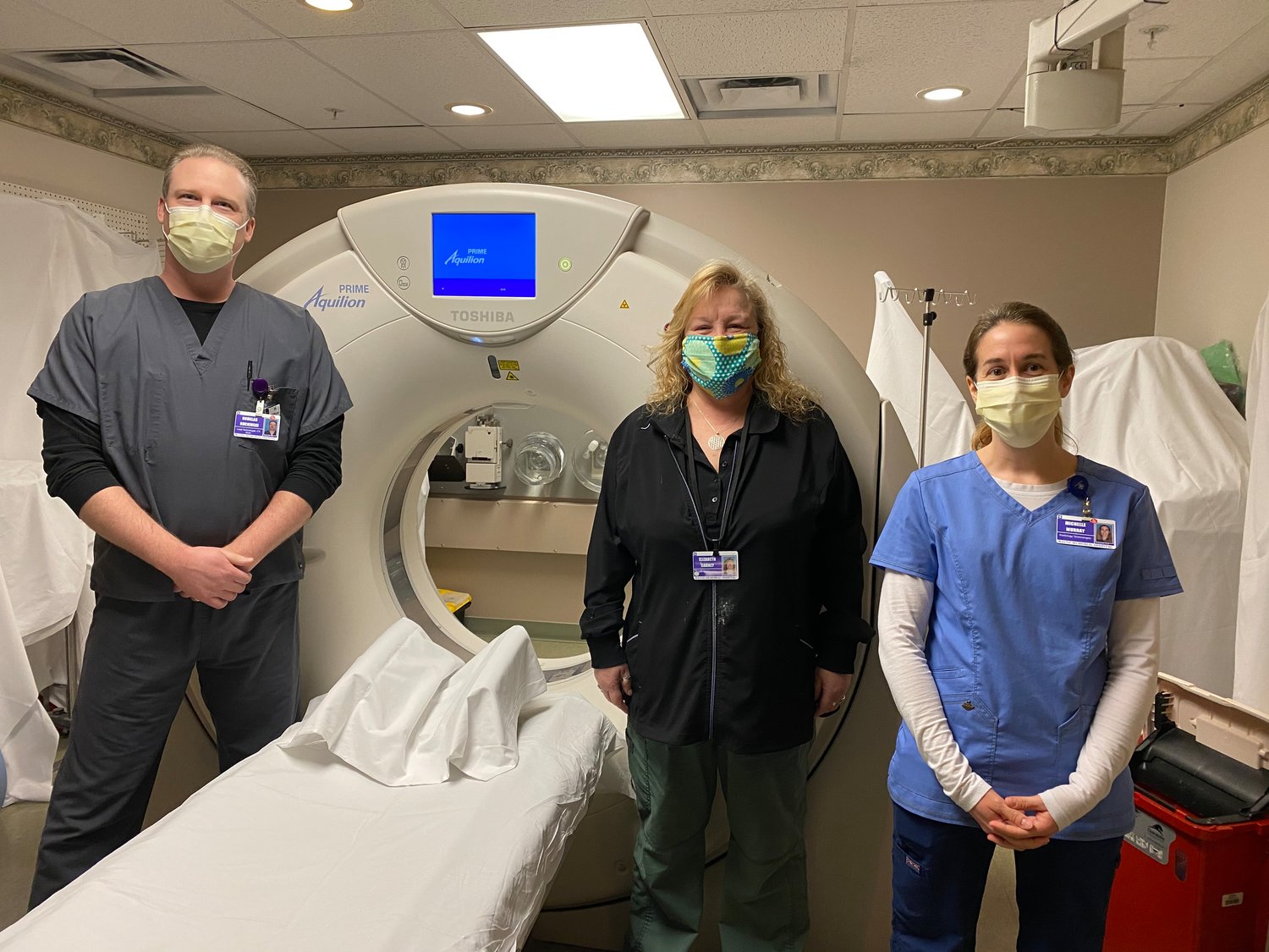 Wayne Memorial CT scan technologists Doug Buchinski, left, and Michelle Murray, far right, along with MRI technologist Beth Carney, center, say they’re ready to see more patients.